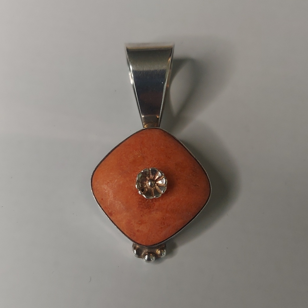 Sterling silver and coral stone